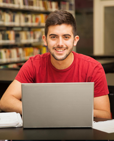Woman studying on laptop